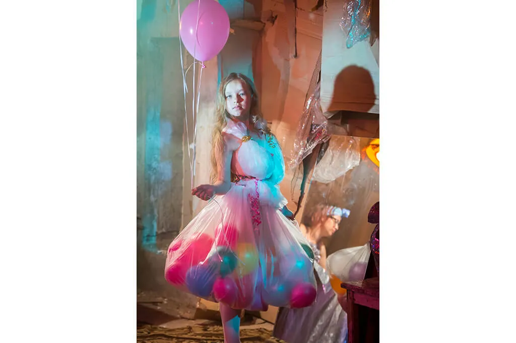 Clear plastic bubble skirt filled with pastel balloons—playful recycled DIY Halloween costume